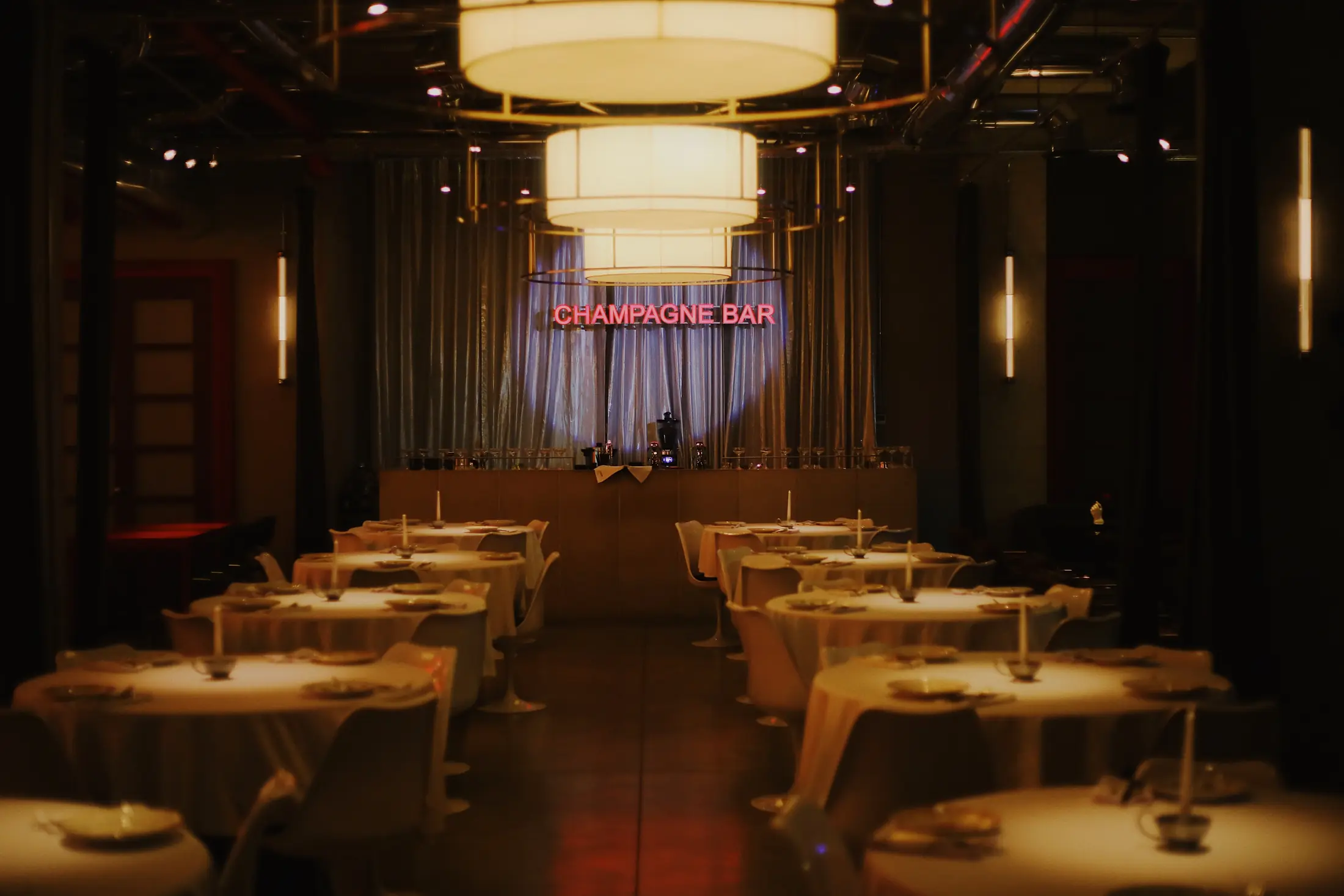 Symmetrical champagne bar dining room