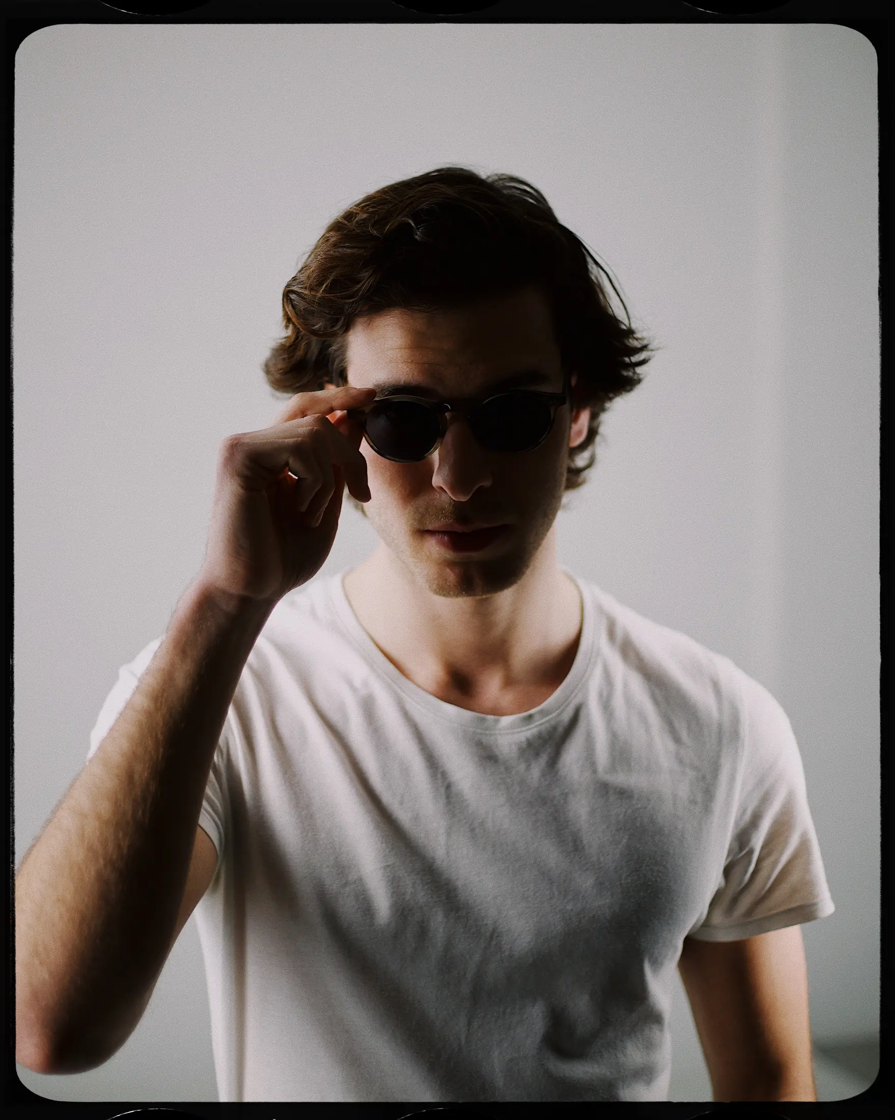 Studio portrait in sunglasses