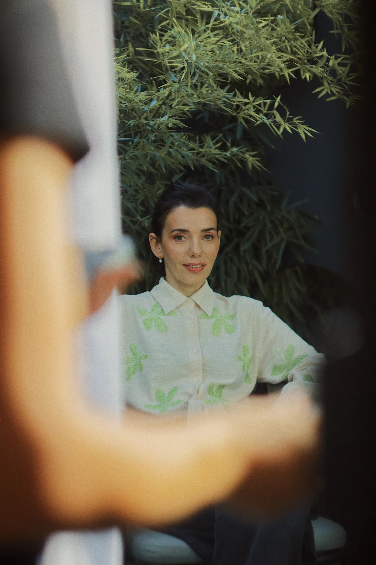 Portrait framed by an olive tree