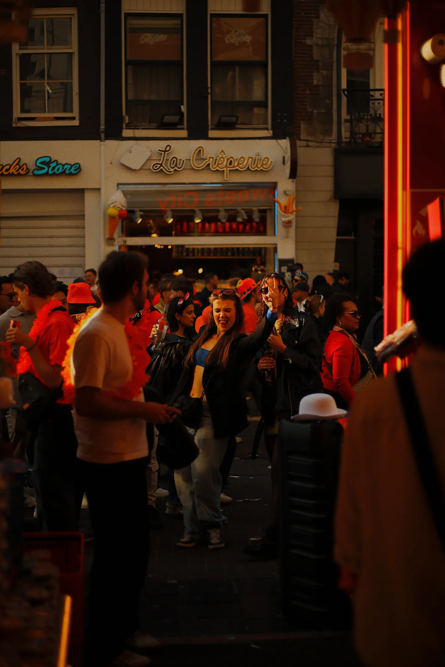 Night crowd outside a cafe