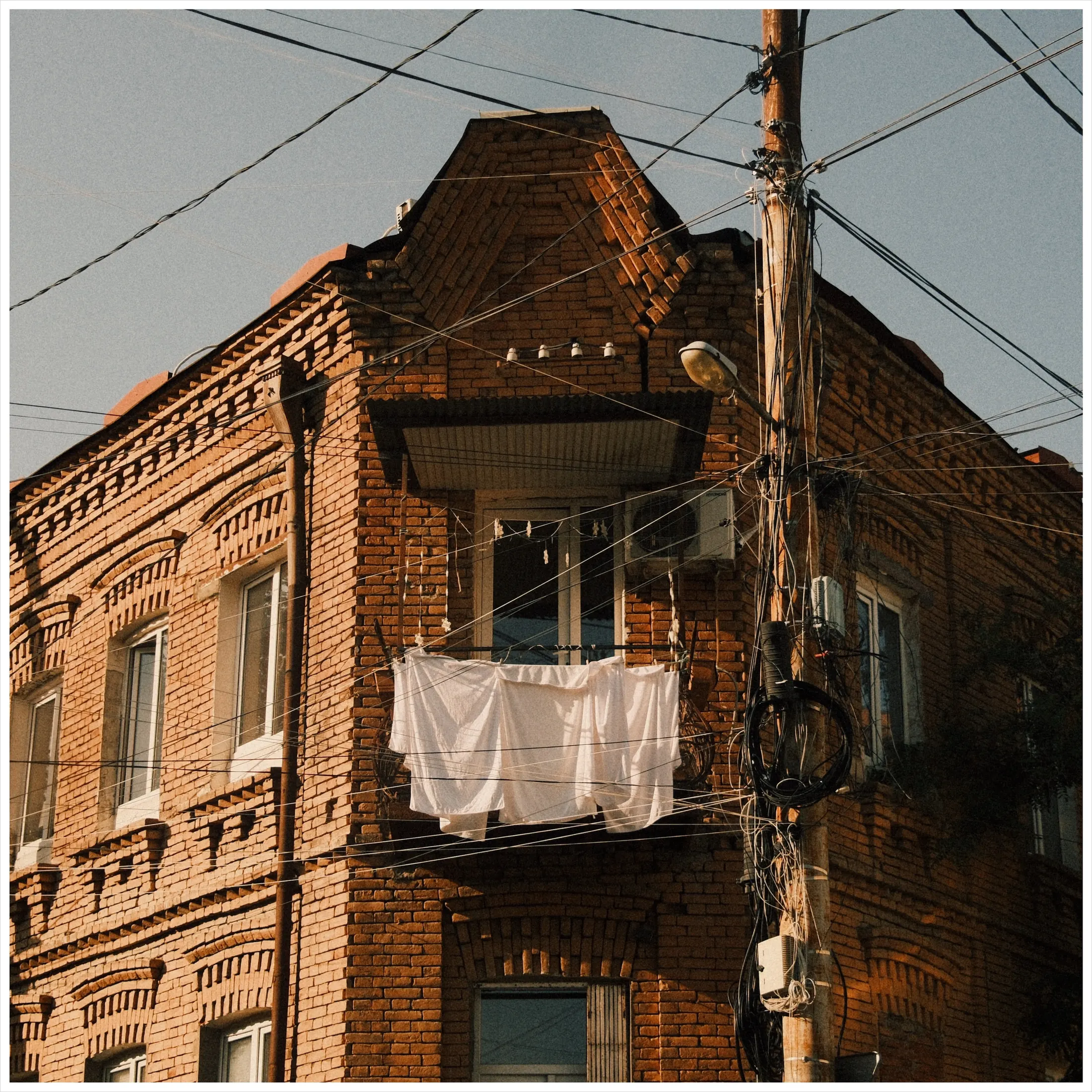 Laundry line on an old brick façade